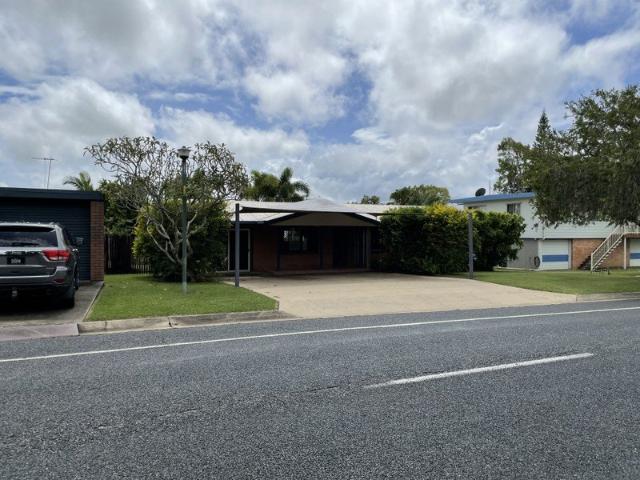 LOW SET BRICK HOME IN PERFECT LOCATION