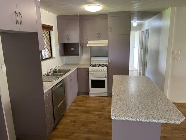 LOW SET BRICK HOME IN PERFECT LOCATION