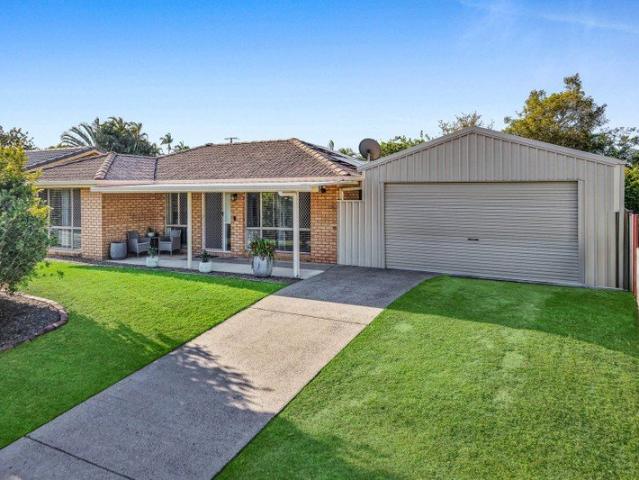 Low Set Brick Home with a Big Backyard & Plenty of Potential