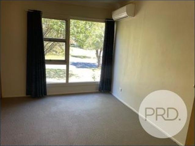 LOW SET THREE BEDROOM BRICK HOME B/L