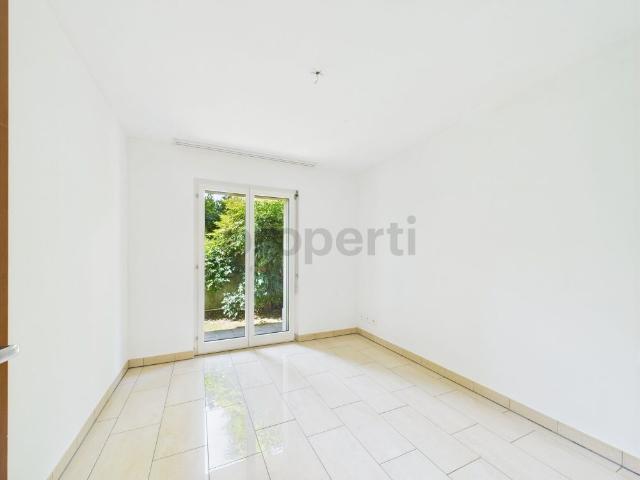Luminoso appartamento da 4.5 locali con giardino a Morcote