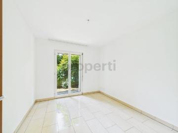 Luminoso appartamento da 4.5 locali con giardino a Morcote