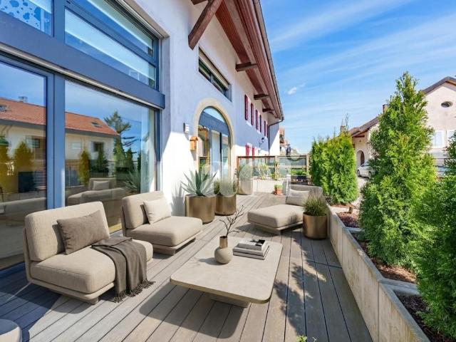 Lumineux et moderne appartement de 3.5 pièces au rez.