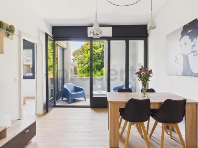 Lugano: elegante 3.5 Zimmer Wohnung mit zwei Balkonen und zwei Parkplätzen in gepflegter Residenz