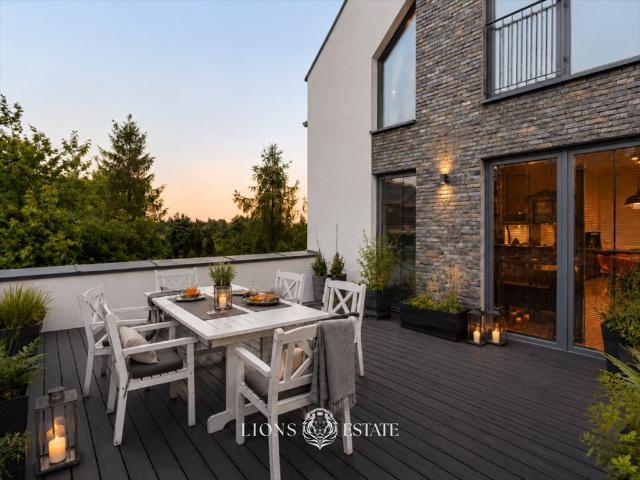 Luksusowy penthouse 180 m² z tarasem i kominkiem w Wilanowie