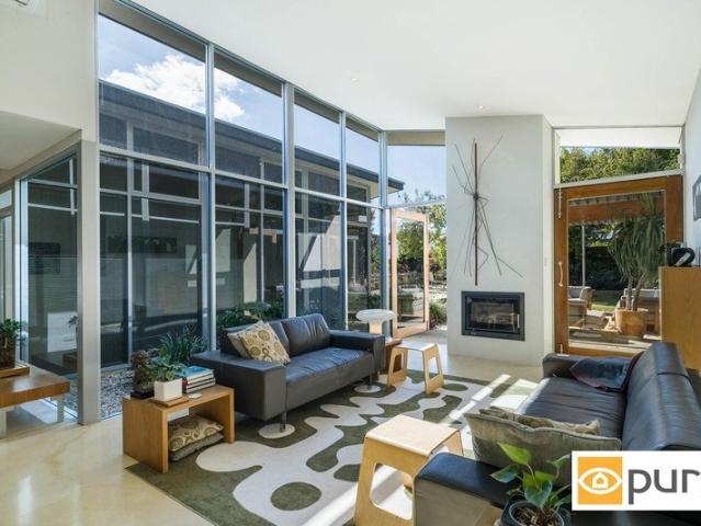 LUSH HAVEN WITH MULTIPLE LIVING ZONES & STUNNING GARDENS
