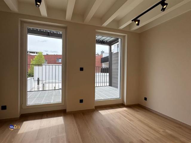 Luxueus afgewerkt duplex appertement met terras in het centrum van Sint Truiden