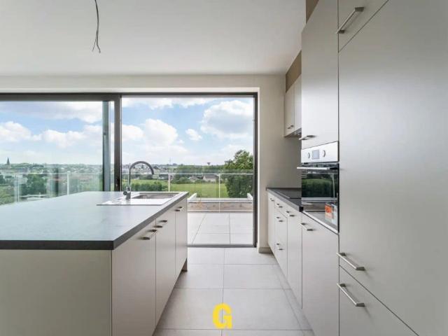 Luxueus energiezuinig penthouse appartement met ruim zonneterras met prachtig verzicht op het stadscentrum en achterliggend groen