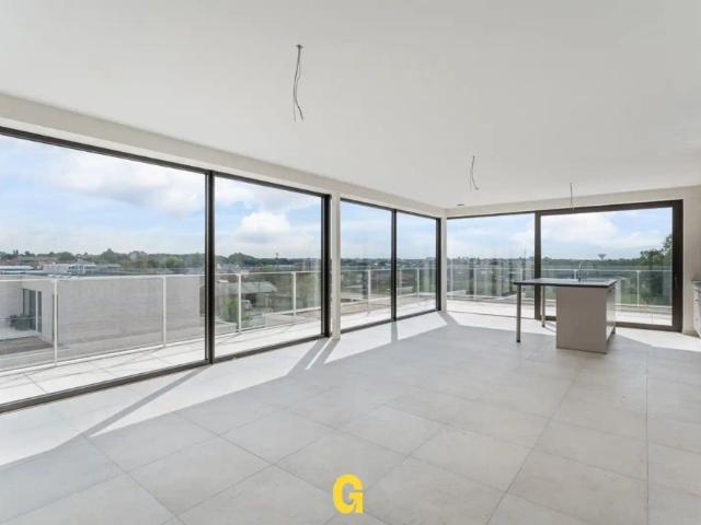 Luxueus energiezuinig penthouse appartement met ruim zonneterras met prachtig verzicht op het stadscentrum en achterliggend groen