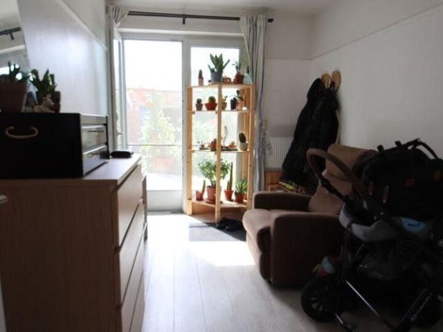 Luxueus gelijkvloers appartement met tuin en carport