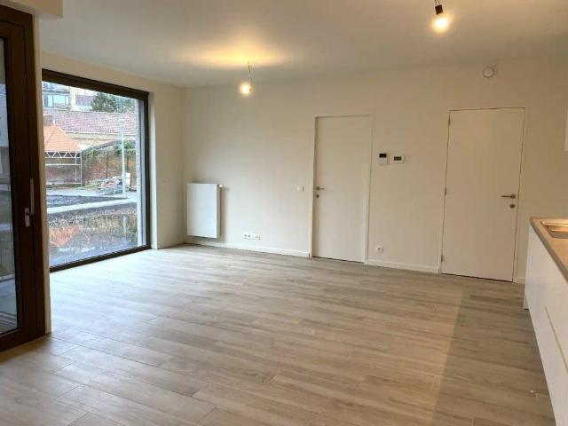Luxueus gelijkvloers nieuwbouwappartement met 1 slaapkamer en autostaanplaats