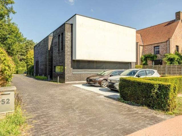 Luxueus, ruim dakappartement met 2 slaapkamers en garage