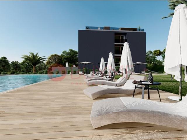 Luxuosos Apartamentos com terraço privativo, piscina comum e estacionamento Olhão