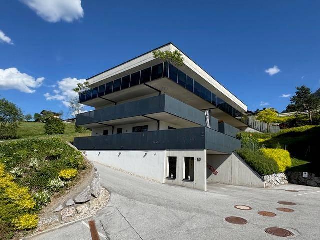 Luxus trifft Alpenpanorama – Penthouse mit Dachterrasse, Garten und traumhaften Kaiserblick