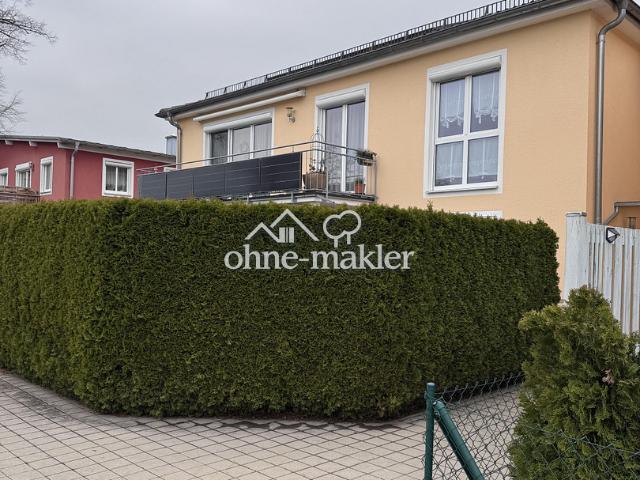 Luxuriöse 4 ZKB Wohnung mit schön angelegtem Garten