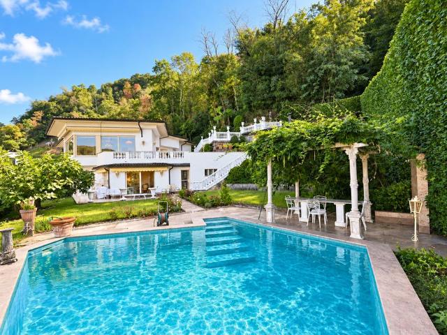 Luxuriöse 4 Schlafzimmer Villa zu verkaufen in Bissone, Schweiz