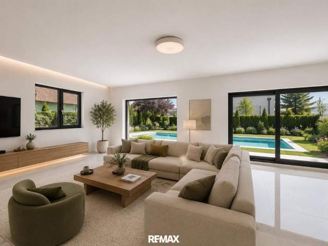 Luxuriöse Doppelthaushälfte mit Pool, Garten und hochwertiger Ausstattung!