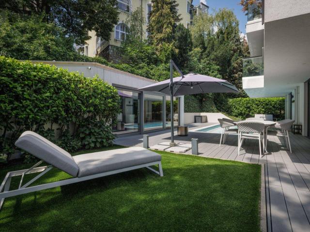 Luxuriöse, Designerwohnung mit Pool, Garten & Wellnessbereich
