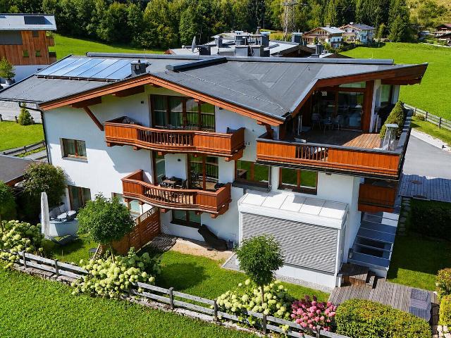 Luxuriöse Obergeschosswohnung in Aurach mit Bergblick