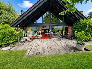Luxuriöse Villa in Comano zu verkaufen. Garten und Aussicht