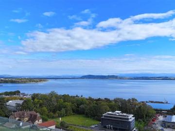 Luxuriöses Penthouse mit 6,5 Zimmern mit Blick auf den See und die Berge