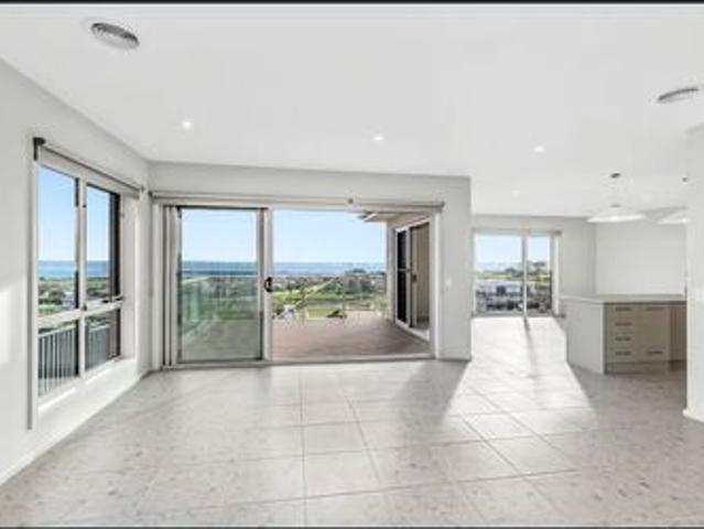 Luxurious Coastal Living with Panoramic Bay Views