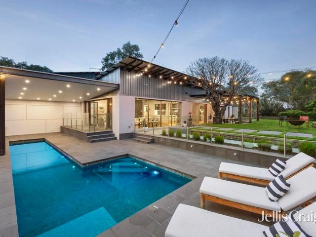 Luxurious contemporary entertainer on a serene acreage