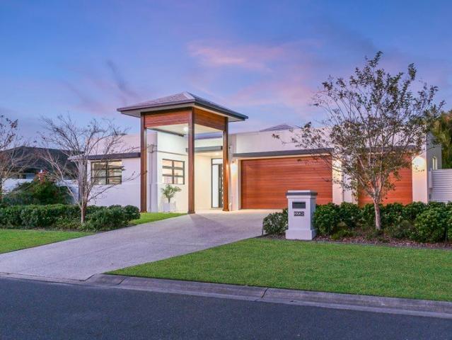 Luxurious and Substantial. Single level waterfront home on 1100m in a premier location