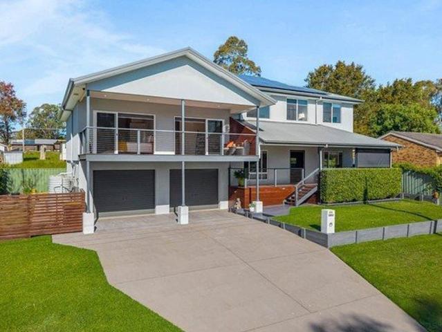 Luxurious Bonnells Bay Home: 4BR, Solar, Multiple Living Areas, $1.25M