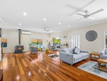 Luxurious Bonnells Bay Home: 4BR, Solar, Multiple Living Areas, $1.25M
