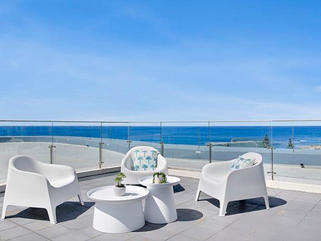 Luxurious Beachside Penthouse with Panoramic Views