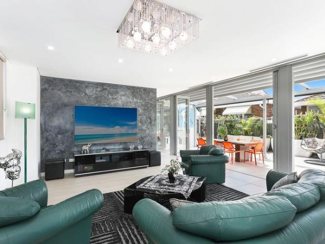 LUXURIOUS DESIGNER HOME IN COASTAL SETTING