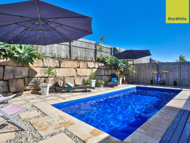 Luxurious Modern Home with Solar and Pool Just Move In and Enjoy!
