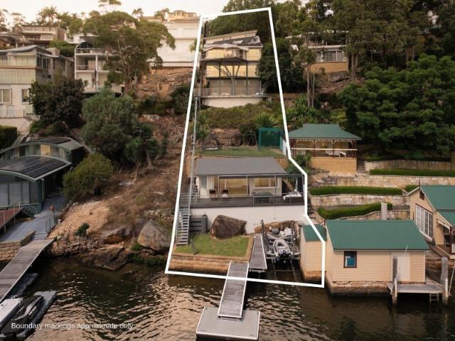Luxurious Multi Level Waterfront Retreat with Versatile Living Spaces