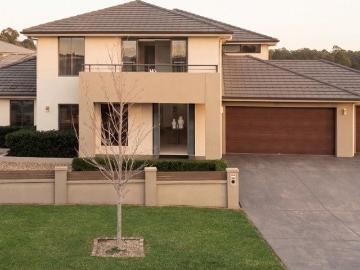 Luxurious Six Bedroom Dual Residence with Expansive Living and Triple Garage