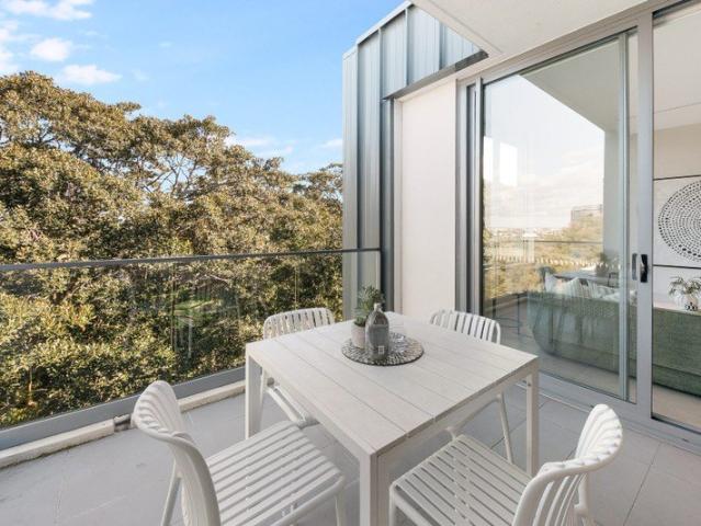 Luxurious Top Floor Living in the Prestigious 'Garden House' Residence
