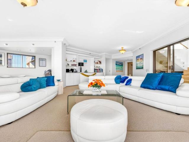 Luxurious Two Level Penthouse in Prestigious Paradise Waters!