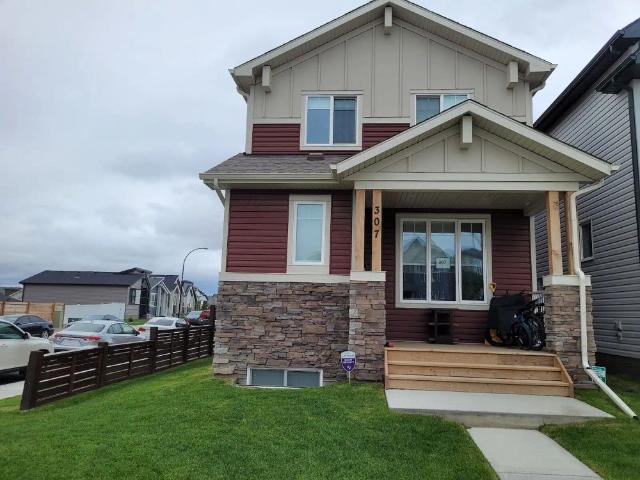 luxuriously Finished 4 Bed, 3.5 Bath Home in Livingstone NW — 4 Bedrooms Main Floor