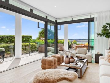Luxuriously Renovated Ground Floor Haven Revealing Breathtaking Broadwater Views!