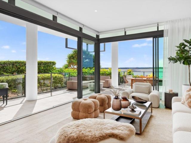 Luxuriously Renovated Ground Floor Haven Revealing Breathtaking Broadwater Views!