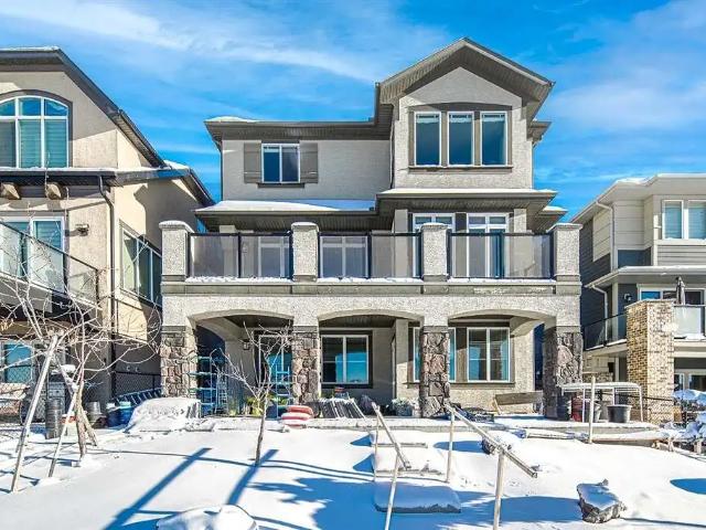 Luxury 4 Bed Walkout Home Backing onto Wetlands in Mahogany!