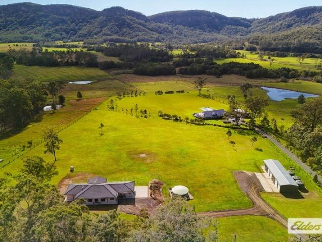 Luxury Country Living on 5.6 Acres with Huge Shed and Spectacular Views