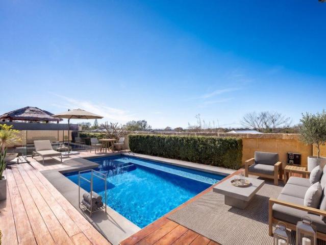 Luxury Coastal Living, Just Moments from the Beach