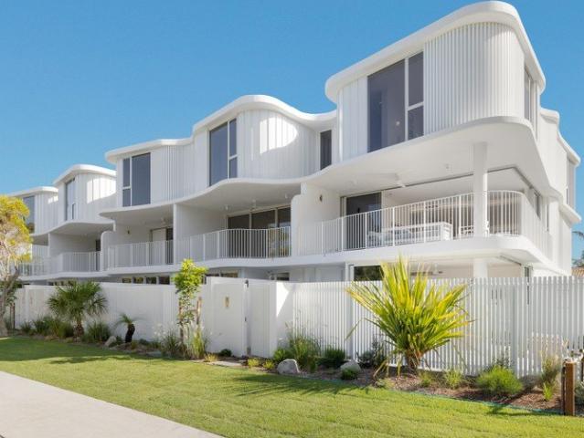 Luxury Coastal Living Just Steps from the Beach