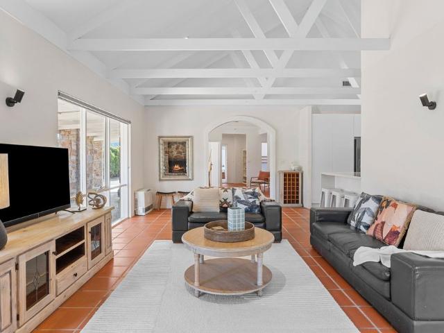 Luxury Coastal Living with Tuscan Charm in Prime St Andrews Beach Location!