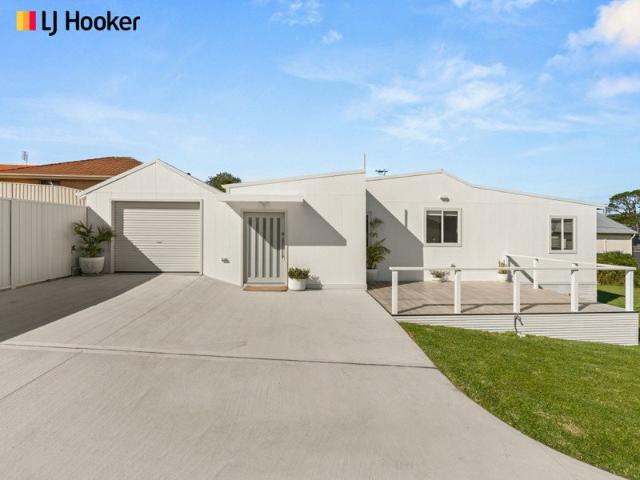 Luxury Coastal Living with River Views & Development Potential