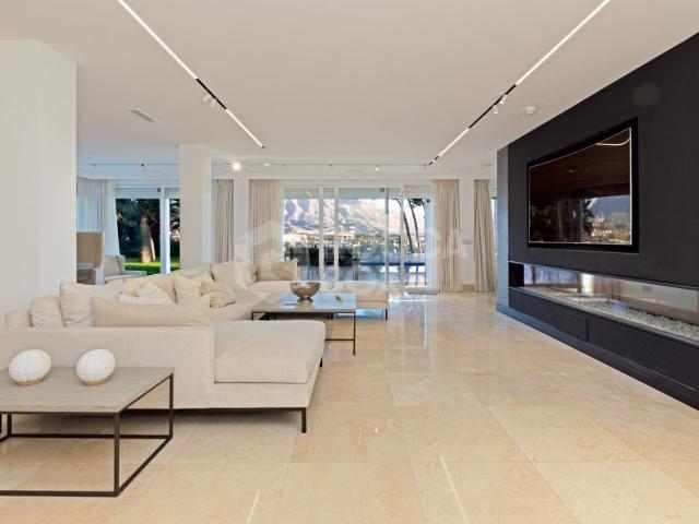 Luxury contemporary villa with spectacular sea and mountain views for short term rent in Nueva Andalucia, Costa del Sol
