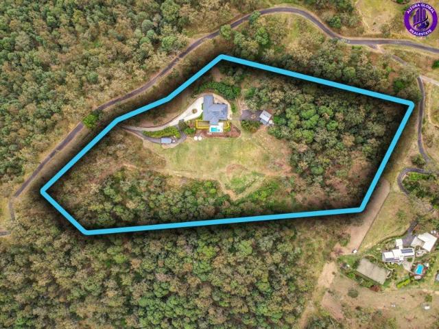 LUXURY ACREAGE LIVING WITH UNMATCHED PANORAMIC VIEWS