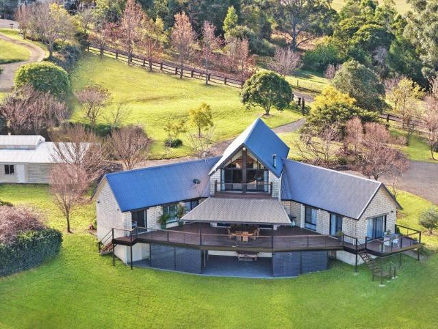 Luxury Acreage Living with Exceptional Equestrian Facilities