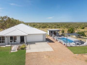 Luxury Acreage Living with Resort Style Features, Productive Land & Approved Dual Living